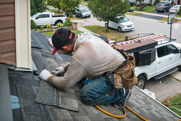 Professional Gutter Repair And Installation technician working in Westhampton, NY
